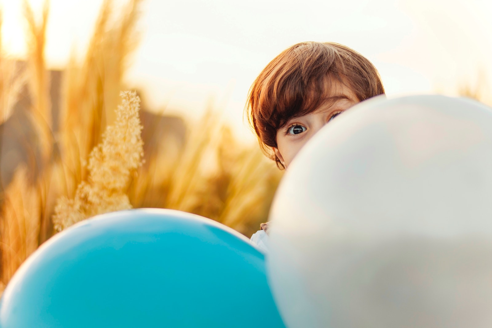 woman hiding on balloon