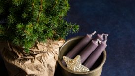 four purple taper candles