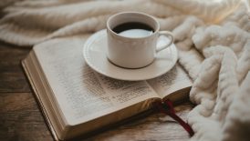 white ceramic cup on white ceramic saucer