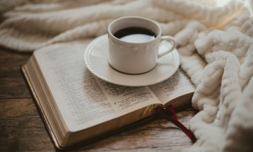 white ceramic cup on white ceramic saucer