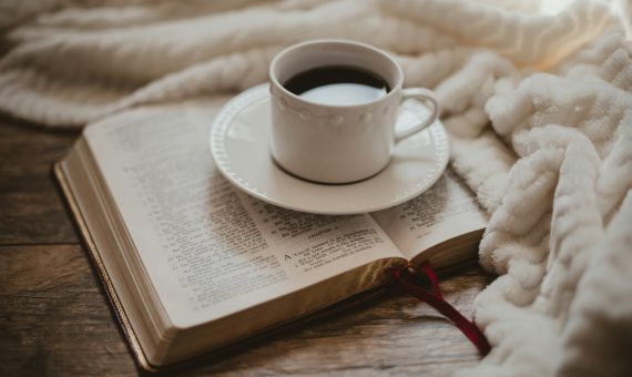 white ceramic cup on white ceramic saucer